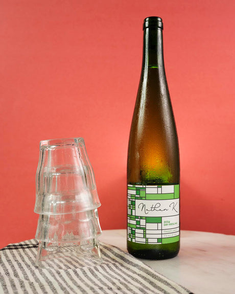 Stylized image of Nathan K. Riesling