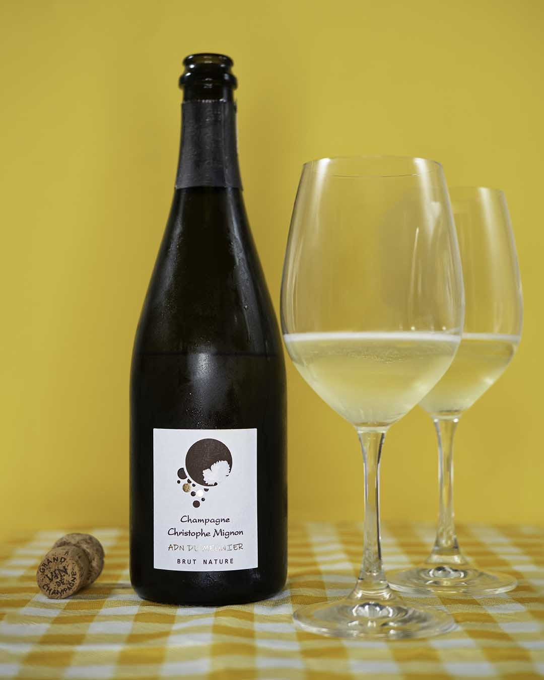 Stylized image of Christophe Mignon, Champagne Blanc de Noirs ADN de Meunier Brut Nature, NV