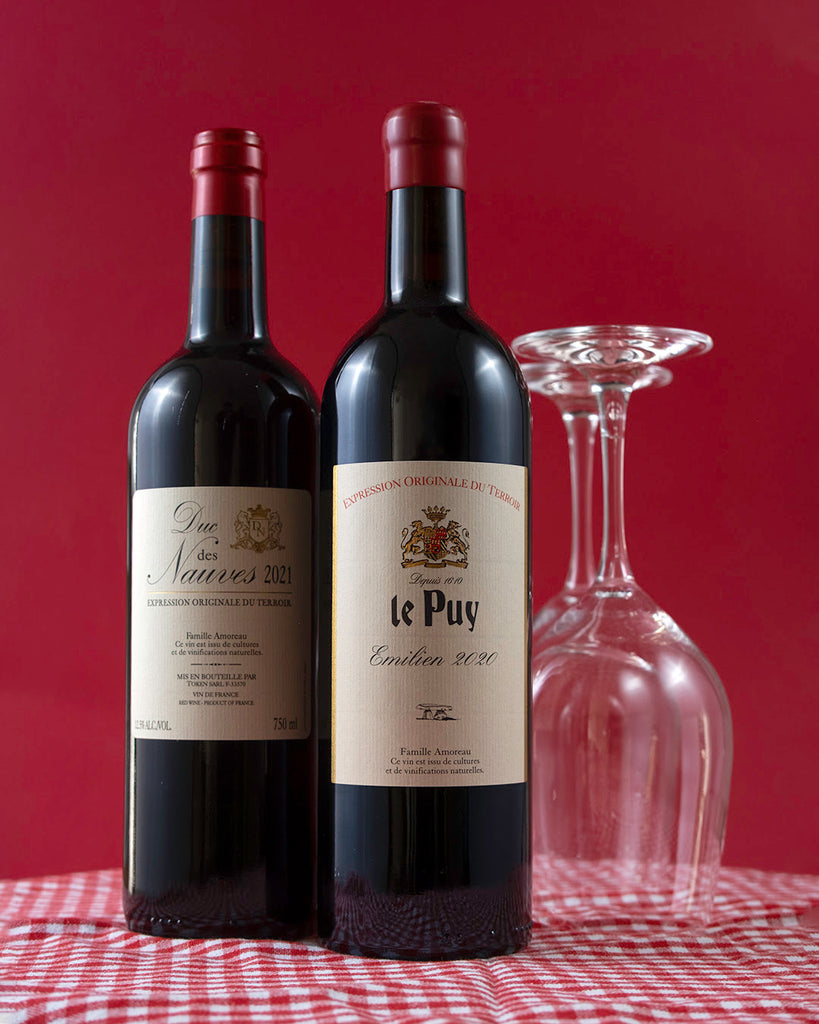 Stylized image of Chateau Le Puy bottles